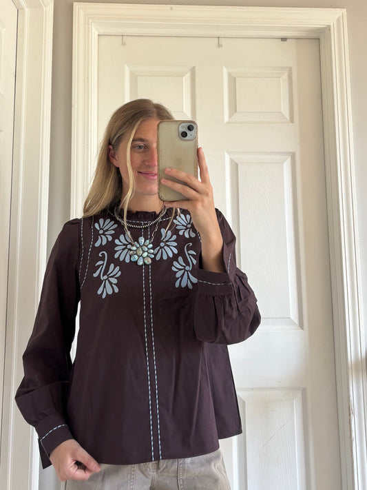 Embroidered Ruffled Mock Neck Top